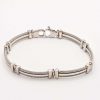 Bracelet cable acier et or homme