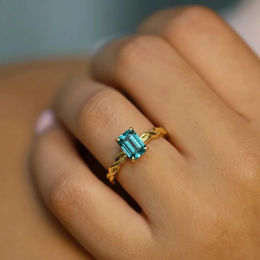 Bague de fiançailles tressée centre saphir teal taille radian